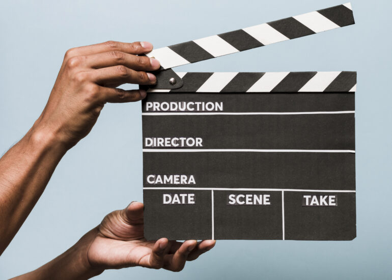 Film production clapperboard on set
