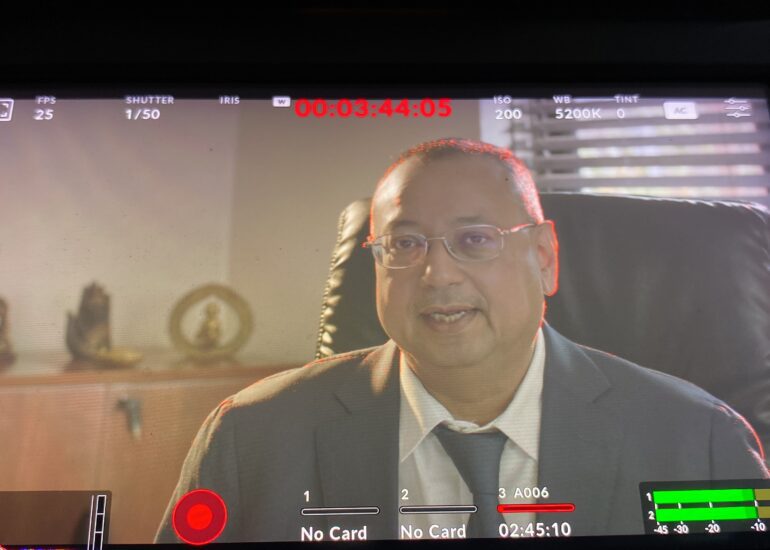 Documentary interview on a cinema camera monitor