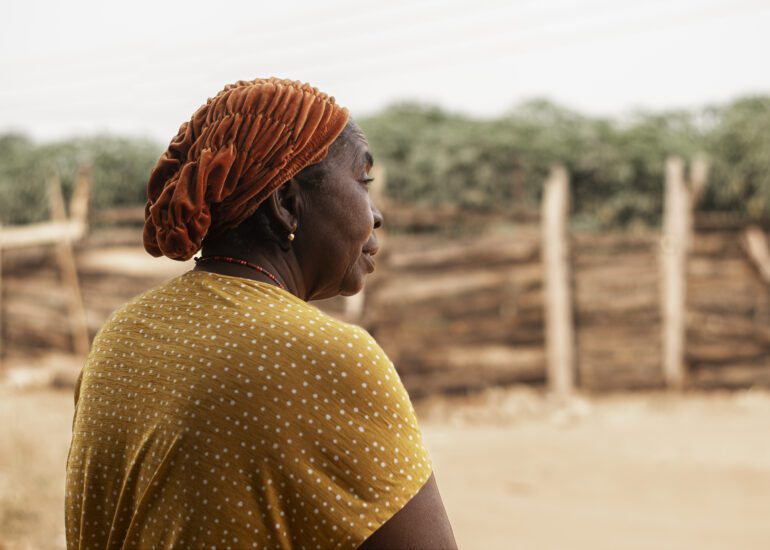 Documentary portrait of an African elder outdoors
